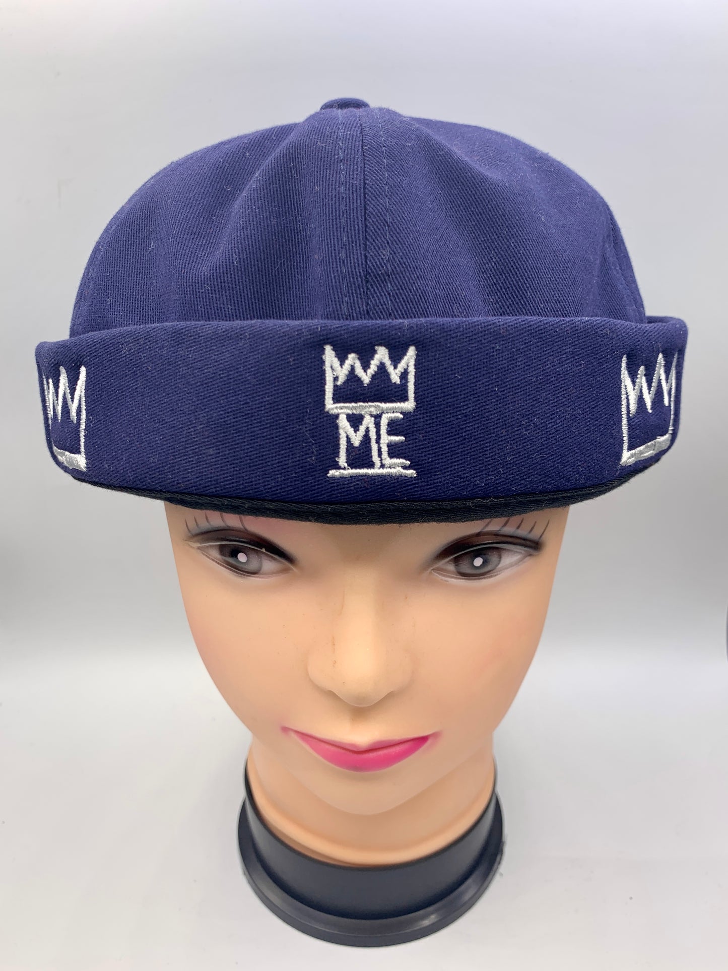 Blue Brimless Hat with White Krown