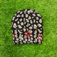 Black & Gray Furry Cheetah Print Beanie with Red Krown